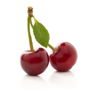 red cherry with green leaves on a white background